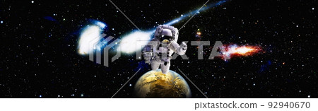Astronaut in outer space.Cosmic art, science fiction wallpaper. Beauty of deep space. Elements of this image furnished by NASA Astronaut in outer space.Cosmic art, science fiction wallpaper. Beauty of deep space. Elements of this image furnished by NASA 92940670
