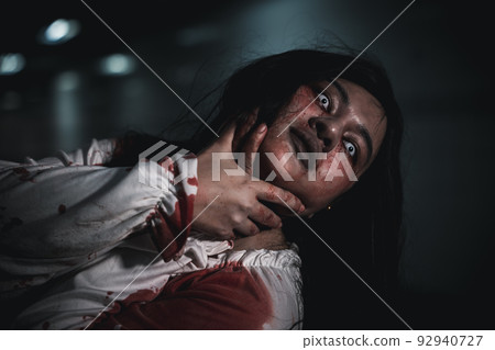 Horror bloodthirsty woman ghost or zombie she is horror scary with breaks her neck Horror bloodthirsty woman ghost or zombie she is horror scary with breaks her neck 92940727