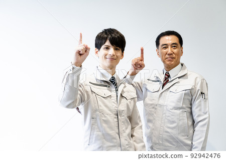 Men in work clothes, white back 92942476