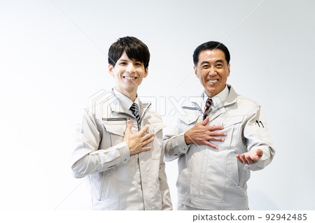 Men in work clothes, white back 92942485