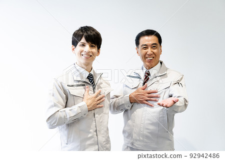 Men in work clothes, white back 92942486