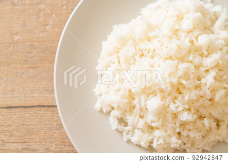 cooked rice on plate 92942847