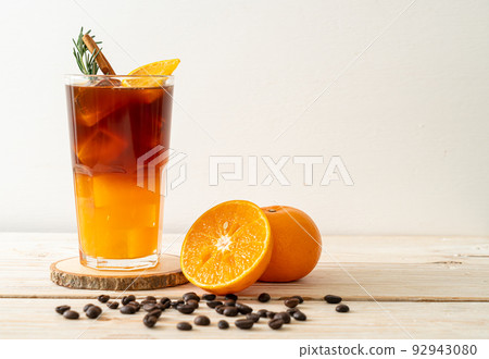 black coffee with orange and lemon juice 92943080