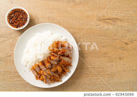 fried pork topped rice with dipping sauce 92943099