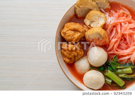 small flat rice noodles with fish balls and shrimp balls in pink soup, Yen Ta Four or Yen Ta Fo small flat rice noodles with fish balls and shrimp balls in pink soup, Yen Ta Four or Yen Ta Fo 92943209