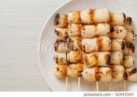 grilled tube shaped fish paste cake skewe or tube squid skewer grilled tube shaped fish paste cake skewe or tube squid skewer 92943597
