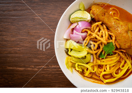 Northern Thai noodle curry soup with chicken Northern Thai noodle curry soup with chicken 92943818