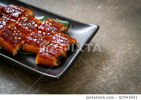 sliced grilled eel or grilled unagi with sauce sliced grilled eel or grilled unagi with sauce 92943881