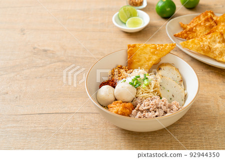 spicy egg noodles with fish balls and shrimp balls without soup spicy egg noodles with fish balls and shrimp balls without soup 92944350