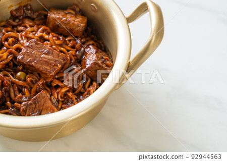 Jjapaguri or Chapaguri, Korean Black Beans Spicy Noodles with Beef 92944563
