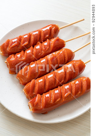 fried sausage skewer on plate fried sausage skewer on plate 92944893
