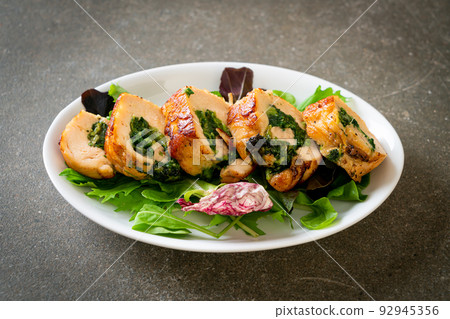 chicken breast stuffed with cheese and spinach 92945356
