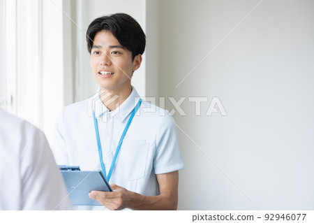 A man in a uniform making a request 92946077