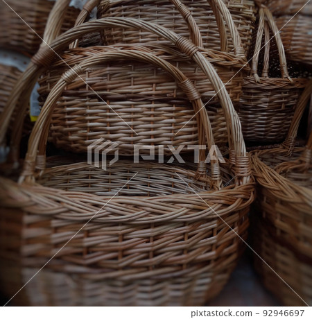 Woven reed baskets with wicker handles stock photo Woven reed baskets with wicker handles stock photo 92946697
