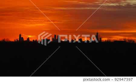 CHICAGO, ILLINOIS, UNITED STATES - DEC 11, 2015: Chicago skyline during sunrise CHICAGO, ILLINOIS, UNITED STATES - DEC 11, 2015: Chicago skyline during sunrise 92947397