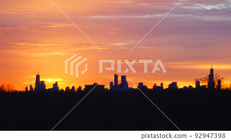 CHICAGO, ILLINOIS, UNITED STATES - DEC 11, 2015: Chicago skyline during sunrise CHICAGO, ILLINOIS, UNITED STATES - DEC 11, 2015: Chicago skyline during sunrise 92947398