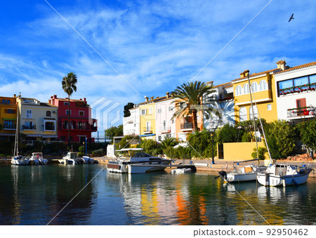 Jetty with yacht. Yachts and motor boats in marina Port Saplaya, Valencia. 92950462