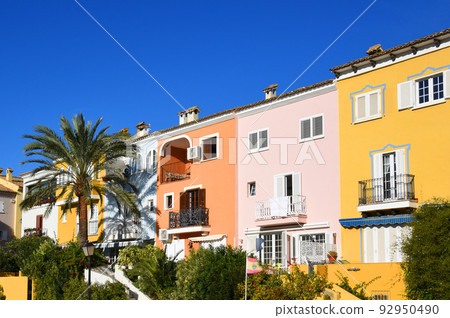 Facade building in colorfull. Residential building with balconies and windows. 92950490