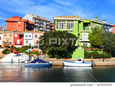 Facade building in colorfull. Residential building with balconies and windows. 92950495