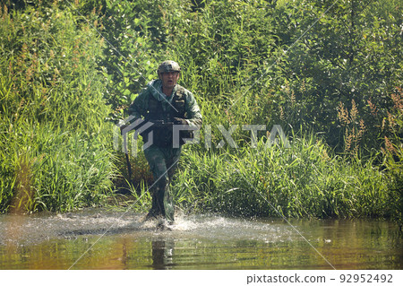 Full military experience - One day commando - running through the water with automatic rifle replica Full military experience - One day commando - running through the water with automatic rifle replica 92952492
