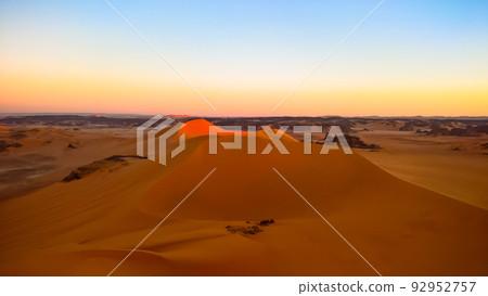 Sunset view to Tin Merzouga dune at Tassili nAjjer national park in Algeria Sunset view to Tin Merzouga dune at Tassili nAjjer national park in Algeria 92952757