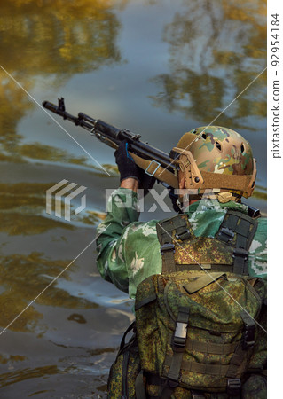 Soldiers game on military training ground battle camp. Action. Operation Trainer giving training to military soldiers at boot camp 92954184