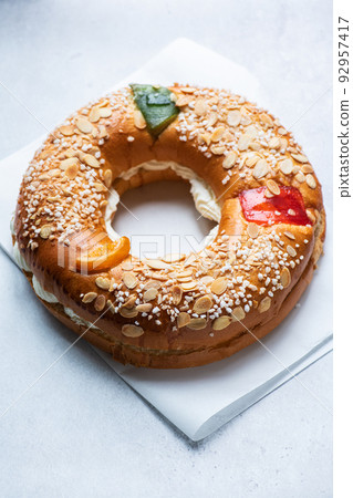 Roscon de Reyes - traditional Spanish festive baking. Roscon de Reyes - traditional Spanish festive baking. 92957417