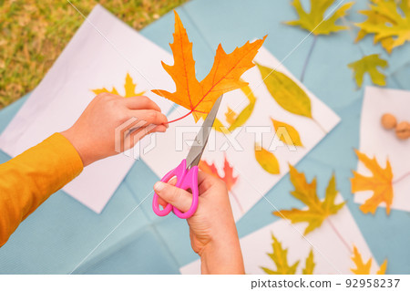 Diy art kid creative play learning outside school outdoor learning park. Kids workshop children scissors cutting leaves art craft kids handmade autumn child art education nature creative autumn leaves 92958237