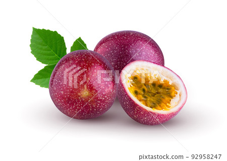 Whole passionfruit and a half of maracuya isolated on white background. Whole passionfruit and a half of maracuya isolated on white background. 92958247