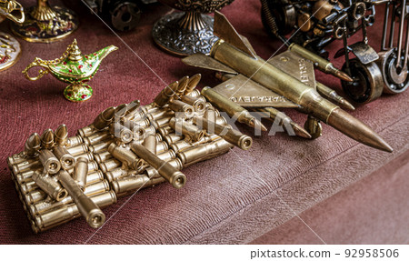 Sarajevo, Bosnia - May 2, 2022 - Wartime bullets have been converted into peacetime desk ornaments Sarajevo, Bosnia - May 2, 2022 - Wartime bullets have been converted into peacetime desk ornaments 92958506