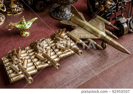 Sarajevo, Bosnia - May 2, 2022 - Wartime bullets have been converted into peacetime desk ornaments Sarajevo, Bosnia - May 2, 2022 - Wartime bullets have been converted into peacetime desk ornaments 92958507