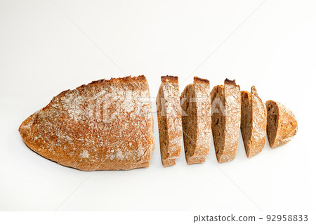 Sliced bread isolated on a white background. Bread slices viewed from above. Top view. Food abstractions 92958833