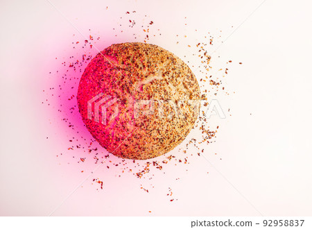 Fresh Artisan round Bread or bun with sesame and flax seeds Isolated on White Background with pink spotlight. Flat lay. Food concept. 92958837