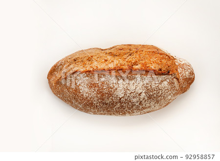 Artisan bread on white background. One loaves on wheat bread on white background. Artisan bread on white background. One loaves on wheat bread on white background. 92958857