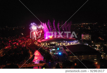 Fireworks above the city, aerial view. Flying during New Year's Eve, 4th of July celebration, music festival 92961617