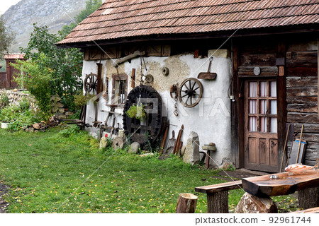 Rural back yard with decoration of vintage objects 92961744