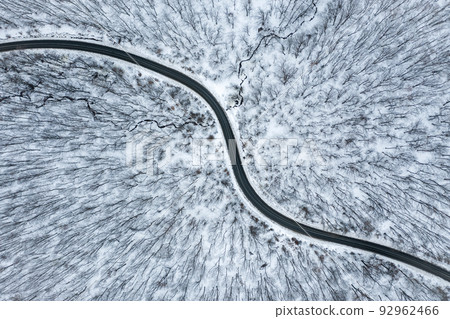 Aerial view of winter forest road Aerial view of winter forest road 92962466
