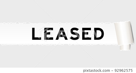 Ripped gray paper background that have word leased under torn part 92962575