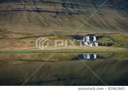 Kirkjufellfoss waterfall in Iceland Kirkjufellfoss waterfall in Iceland 92962665
