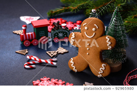 Christmas homemade gingerbread cookies on a dark concrete table table 92965980
