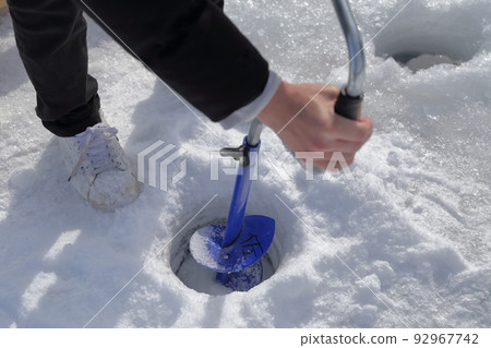 Drilling holes in the ice (smelt fishing, Lake Matsubara, Koumi Town, Nagano Prefecture) Drilling holes in the ice (smelt fishing, Lake Matsubara, Koumi Town, Nagano Prefecture) 92967742