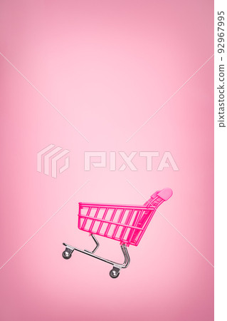Empty trolley cart isolated pink background. Pink shopping trolley supermarket concept. Toy pink concept sales online shopping cart supermarket sales shopping symbol. E commerce. Sale cart shop online Empty trolley cart isolated pink background. Pink shopping trolley supermarket concept. Toy pink concept sales online shopping cart supermarket sales shopping symbol. E commerce. Sale cart shop online 92967995