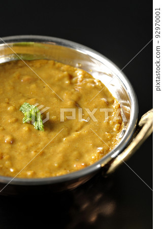 Keema curry using mutton is photographed against a black background 92970001