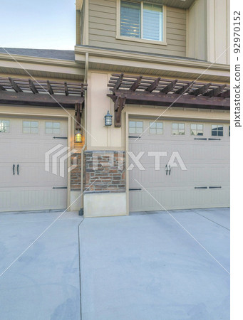 Vertical Three car parking garage with double side hinged doors Vertical Three car parking garage with double side hinged doors 92970152