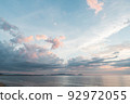 Clouds and coastline floating in the blue sky 92972055