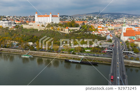 Bratislava town historical center with the Danube river 92973245