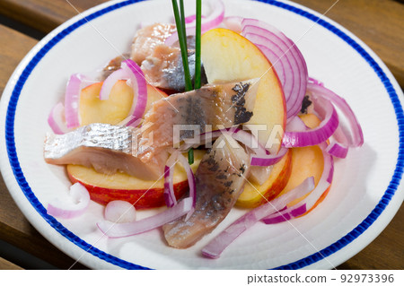Norwegian salad of herring, apples, onion 92973396