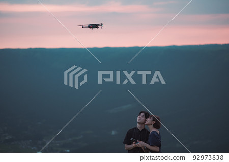 Men and women who fly drones Men and women who fly drones 92973838