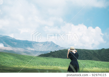 Back view of a woman in nature Back view of a woman in nature 92974115