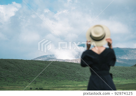 Back view of a woman in nature Back view of a woman in nature 92974125